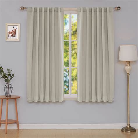 52x63 curtains - BGment Blackout Curtains: 2 panels, each measuring 52x63 inches, come with grommets to fit rods less than 1.6 inches in diameter for easy installation. The curtains feature an off-white front and a khaki back, and they are made from durable, anti-pilling, high-quality and heavyweight composite fabric.